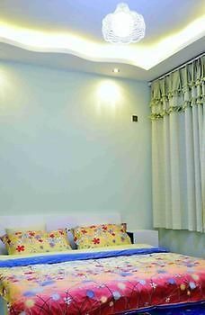 Fenghuang Yiguangnian Fashion Hotel Bagian luar foto
