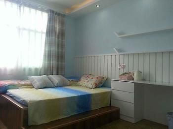 Fenghuang Yiguangnian Fashion Hotel Bagian luar foto