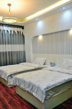 Fenghuang Yiguangnian Fashion Hotel Bagian luar foto