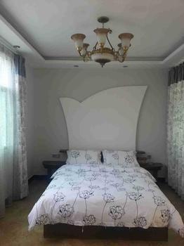Fenghuang Yiguangnian Fashion Hotel Bagian luar foto