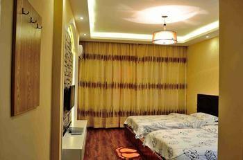 Fenghuang Yiguangnian Fashion Hotel Bagian luar foto