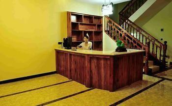 Fenghuang Yiguangnian Fashion Hotel Bagian luar foto