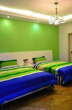 Fenghuang Yiguangnian Fashion Hotel Bagian luar foto
