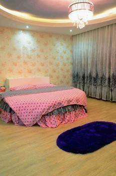 Fenghuang Yiguangnian Fashion Hotel Bagian luar foto