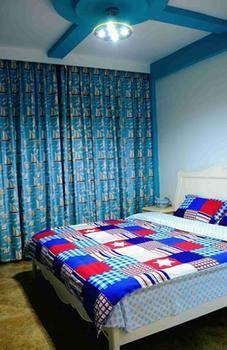 Fenghuang Yiguangnian Fashion Hotel Bagian luar foto