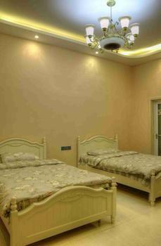 Fenghuang Yiguangnian Fashion Hotel Bagian luar foto